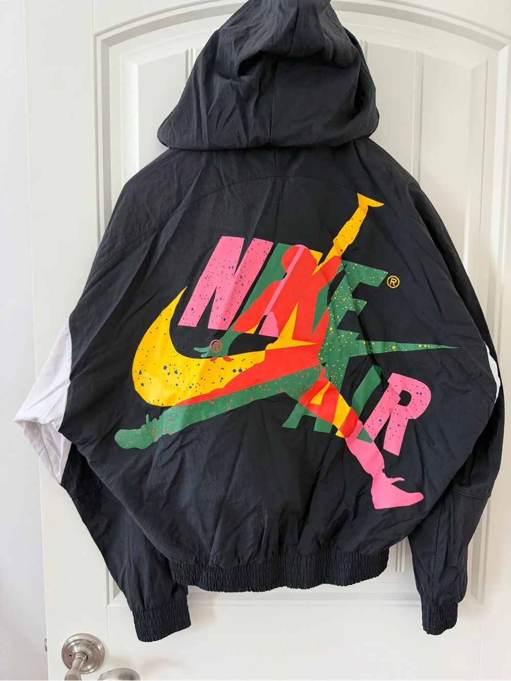 Jordan Black Hooded Windbreaker with Multicolor Logo Accent